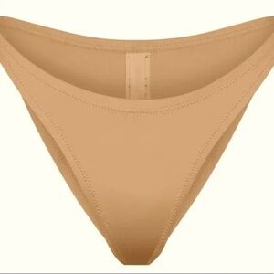 Tan Skims Swim Dipped Mid Waist Bottoms